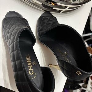 CHANEL Black Quilted Heels with Gold Accents